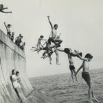 17 5886 Kids Jumping off wall, Lynn Beach